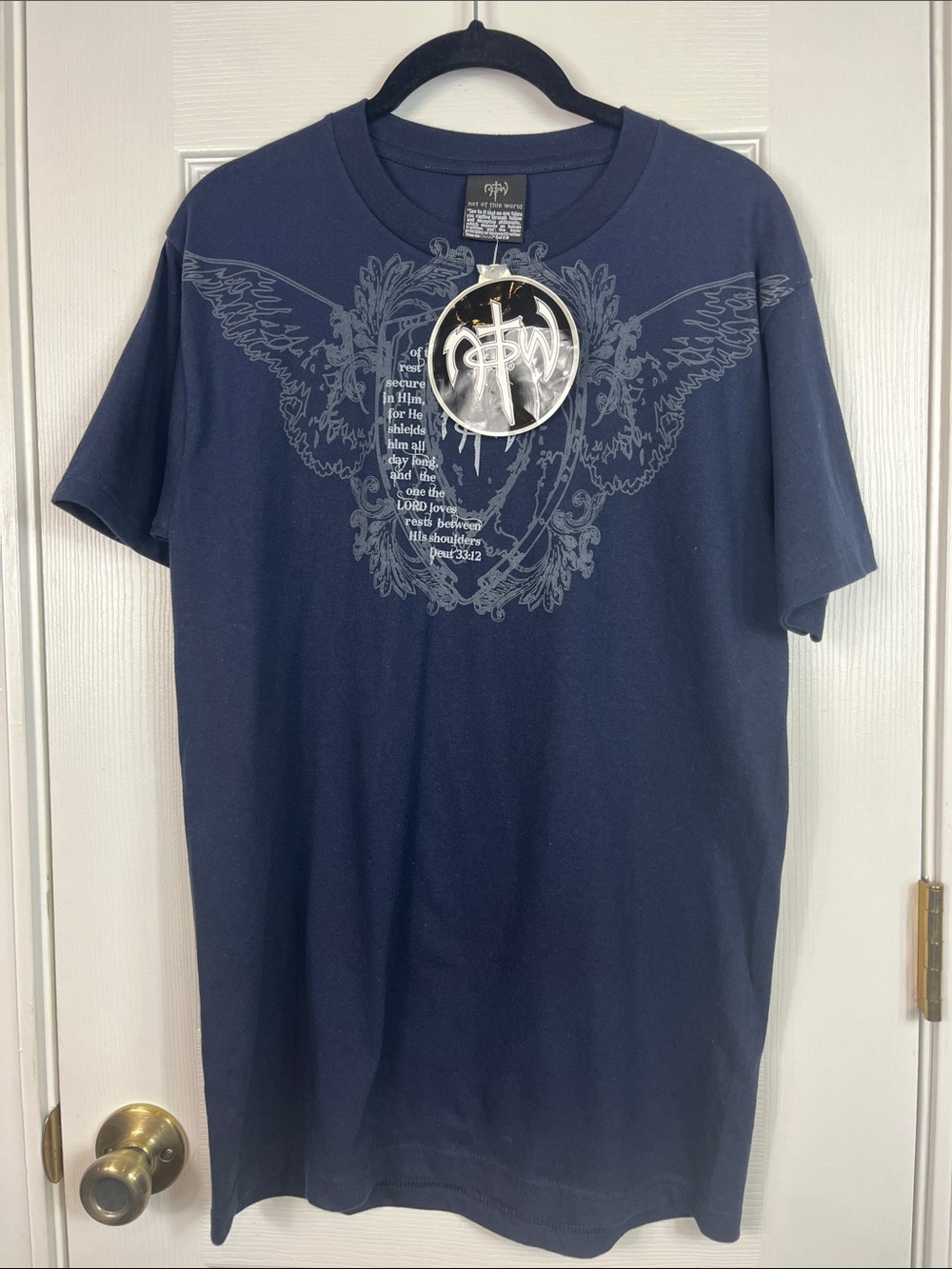 NWT Not of this World black tee shirt size small. Grey lettering. Short sleeves